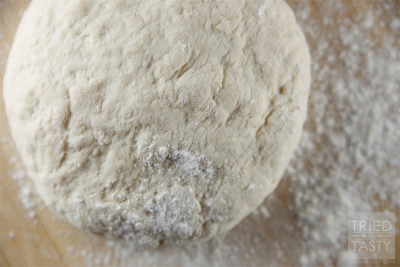 Homemade Pizza Dough // Next to my whole wheat pizza crust, this is hands down my favorite pizza crust. It's absolutely phenomenal and will provide you the perfect pizza every time. Make it today! | Tried and Tasty