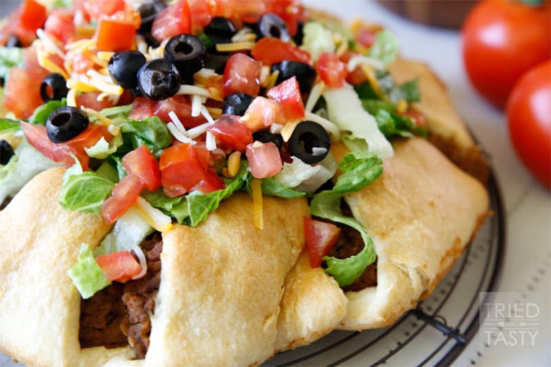 The Pampered Chef Taco Ring // When I was first introduced to Pampered Chef I was invited to a party with my mom. They served this Taco Ring and I fell in love immediately. I've been making this Taco Ring for years and years since and haven't met anyone that doesn't love it as much as I do! | Tried and Tasty