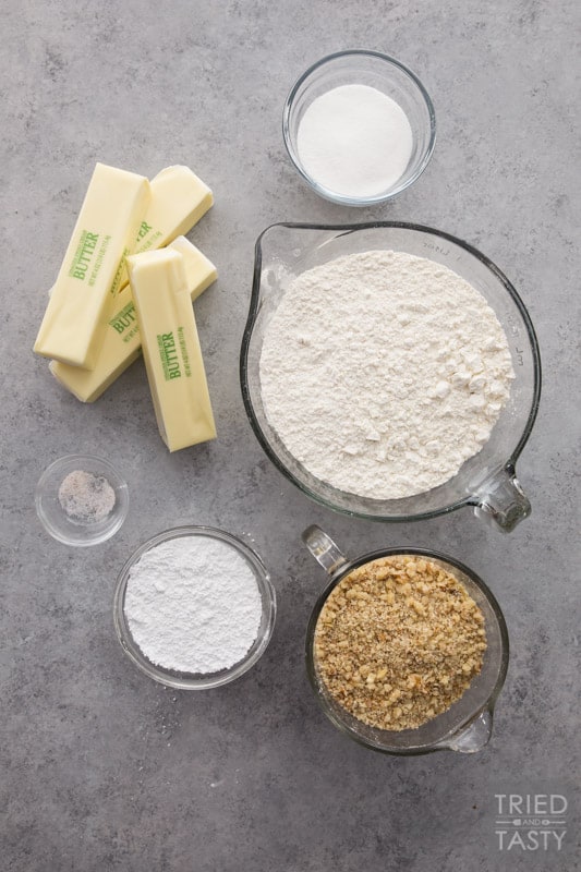 Ingredients: four sticks of butter, bowl of salt, bowl of sugar, powdered sugar, flour and ground nuts