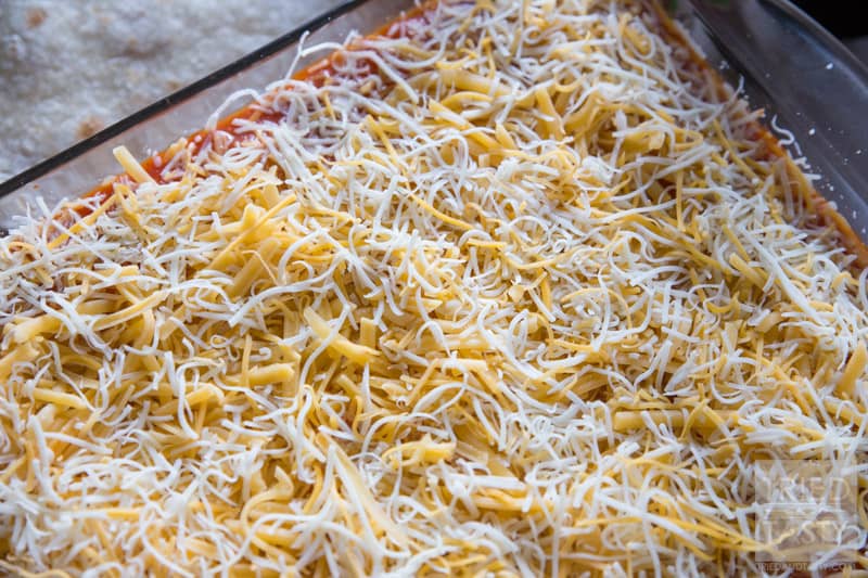Chicken Enchiladas // This is one Chicken Enchilada recipe for the books. Throw this on your menu, and make it as soon as possible. You can thank me later. | Tried and Tasty