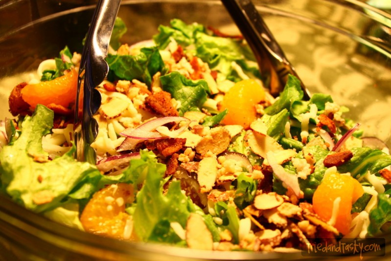 Mandarin Orange Almond Salad Mandarin Orange Almond Salad // Love a good salad with fruit and candied nuts? This Mandarin Orange Almond Salad has a great lineup of flavors that blend so well together. It's a tasty side for any meal. | Tried and Tasty