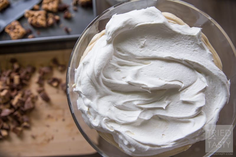 Peanut Butter Trifle // Trifle desserts are great for many reasons. This Peanut Butter Trifle is a peanut butter lover's dream. It's delicious, it's easy to throw together, and it feeds a crowd. Make this for your next party or get together! | Tried and Tasty