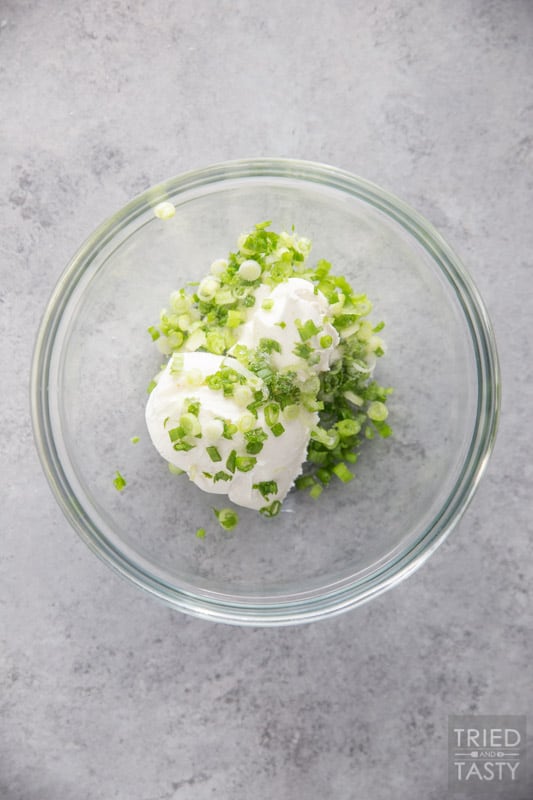 Bowl of cream cheese and green onion