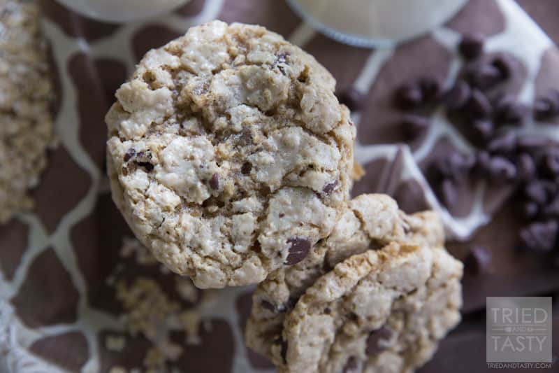 Crunchy Oatmeal Chocolate Chip Cookies // Looking for a little 'crunch' in your cookie? These are absolutely perfect! Just the right amount of crispness surrounded by oodles of chocolate chips and oatmeal. Whip these cookies up in no time! | Tried and Tasty