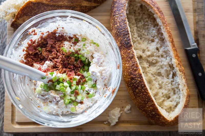 Cheesy Baked Dip // Come see why this is the #1 most viewed recipe on Tried and Tasty! Perfect for any holiday, feeds a crowd - loaded with cheese, ham & bacon (but can easily be made vegetarian!). You don't want to miss this delicious appetizer! | Tried and Tasty