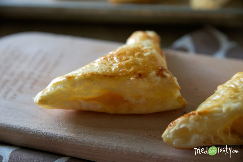 Peach Turnovers // There's nothing quite like biting into a pastry filled with fresh peaches - yum! | Tried and Tasty