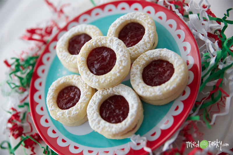 Raspberry-Filled Sugar Cookies with Lemon Zest // Even though the only lemon addition to this recipe is the zest, you’d be surprised what an impact it has.  These sugar cookies are amazing! | Tried and Tasty