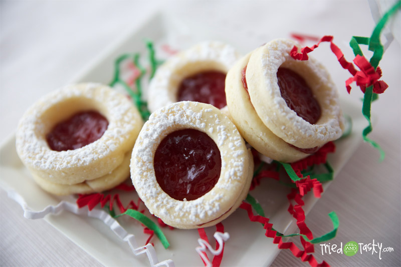 Raspberry-Filled Sugar Cookies with Lemon Zest // Even though the only lemon addition to this recipe is the zest, you’d be surprised what an impact it has.  These sugar cookies are amazing! | Tried and Tasty