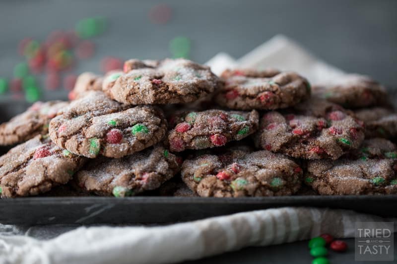 Close up image of chocolate crackletop cookies on a silver platter
