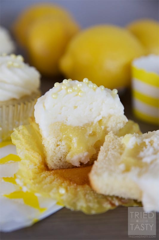 Lemon Curd Filled Cupcakes with Lemon Buttercream Frosting // A yummy lemon filled cupcake that will tickle your tongue and leave you wanting more! | Tried and Tasty