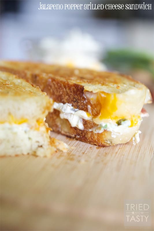 Jalapeno Popper Grilled Cheese Sandwich // If you like traditional jalapeño poppers, you are sure to love this popper transformed grilled cheese. Don't like spicy foods? Don't worry, you can adjust easily to fit any spice tolerance! | Tried and Tasty