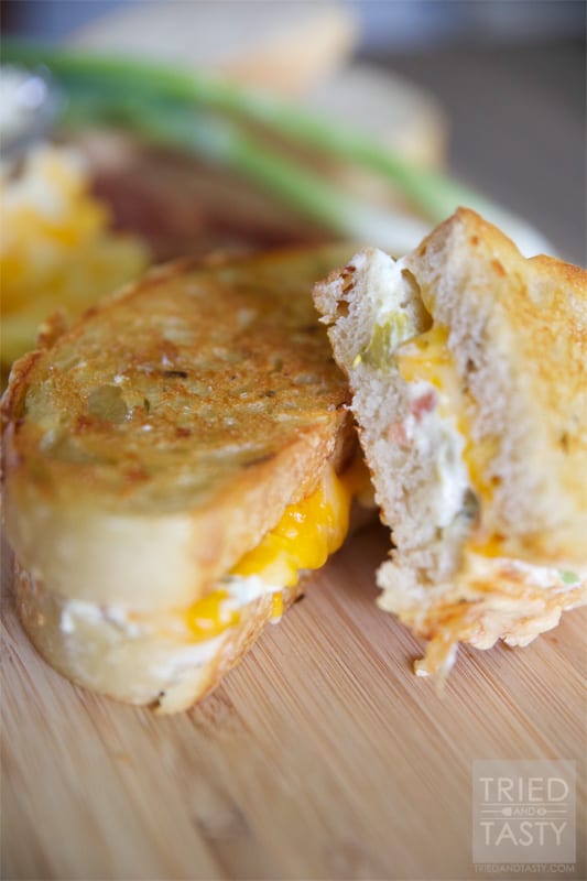 Jalapeno Popper Grilled Cheese Sandwich // If you like traditional jalapeño poppers, you are sure to love this popper transformed grilled cheese. Don't like spicy foods? Don't worry, you can adjust easily to fit any spice tolerance! | Tried and Tasty