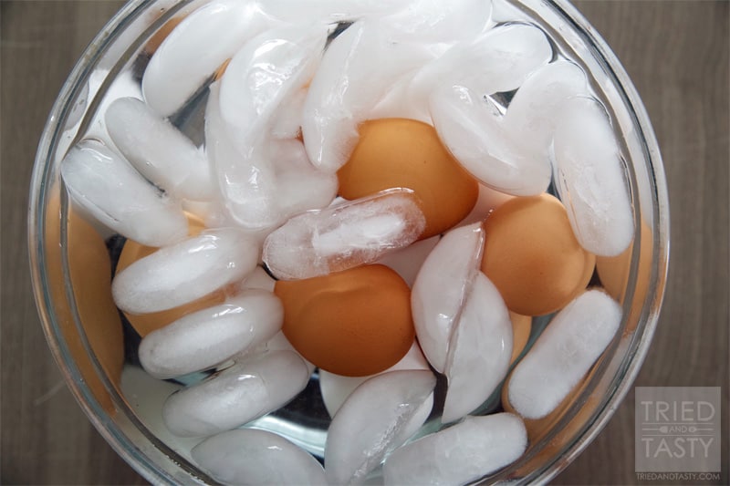 Oven Baked Hard Boiled Eggs // If you need to boil a large batch of eggs all at once or if you haven't been able to master the stove-top boiling method, then you MUST try these super simple oven baked eggs! | Tried and Tasty