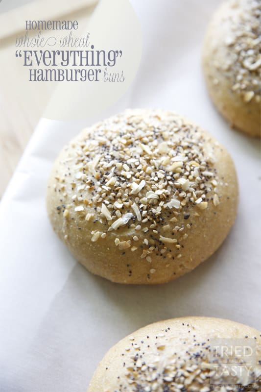 Homemade Whole Wheat Everything Hamburger Buns // If you are familiar with the 'everything' bagel and love it, you will love this hamburger bun. If you aren't familiar with it, you have GOT to give this a try. The smell alone of these baking in the oven is enough to make your senses run wild! | Tried and Tasty