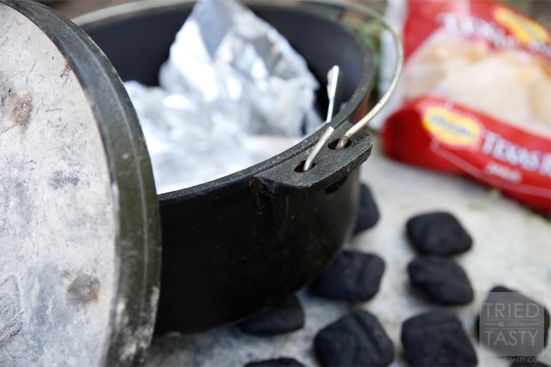 Dutch Oven Cinnamon Nut Pull-Aparts // Five ingredients? So perfect. So easy. And of course, so delicious. All you need is a bag of Rhodes Texas Rolls, some chopped pecans, brown sugar, cinnamon, and butter. That's it! | Tried and Tasty