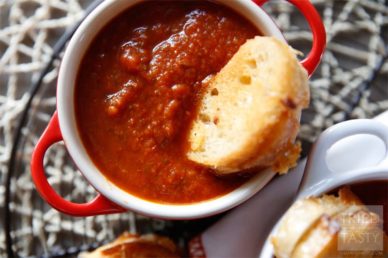 Creamless Tomato Soup // Ever wanted a delicious tomato soup without all the guilt of the cream? This is the perfect recipe for you. A healthy and tasty soup perfect for the cool nights and excellent paired with a grilled cheese sandwich! | Tried and Tasty