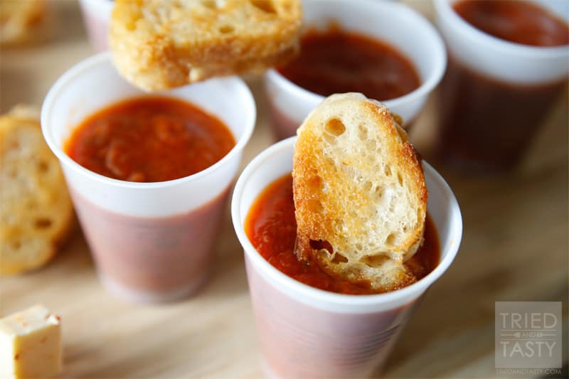 Mini Grilled Cheese Hors d'Oeuvres // These Mini Grilled Cheese Hors d'Oeurves are the perfect party food and will impress all of your guests. Not only are they tasty, they are absolutely adorable! | Tried and Tasty