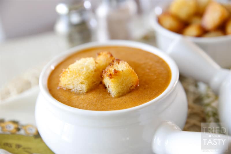 Copycat Zupas Tomato Basil Soup // Enjoy the comfort of Cafe Zupas right in your very own kitchen. With this fantastic Copycat Zupas Tomato Basil Soup recipe you can have your favorite soup anytime you want without so much as stepping one foot outside. This recipe feeds a crowd, make this for your next dinner party! | Tried and Tasty