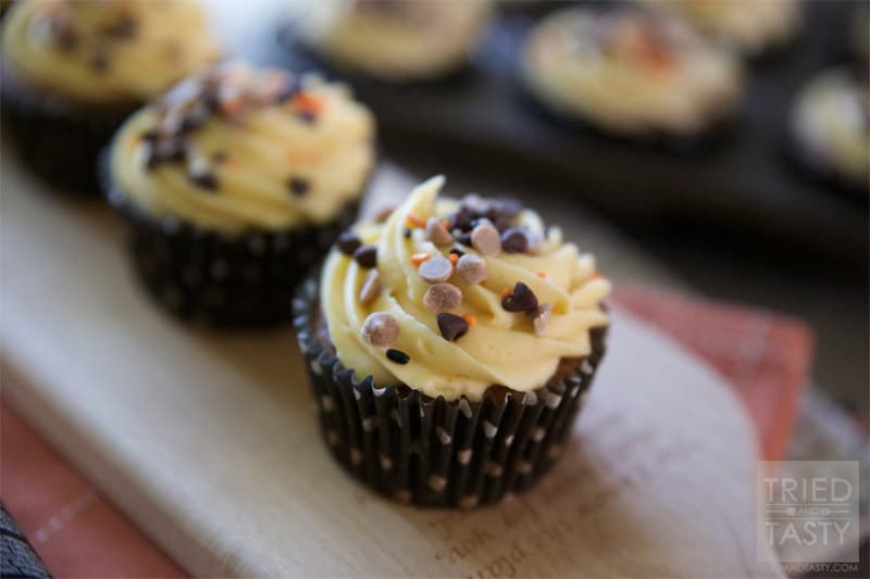Pumpkin Chocolate Chip Cupcakes w/Pumpkin Cream Cheese Frosting // If you've got canned pumpkin lying around and you aren't sure what to do with it, I would highly suggest making these cupcakes. With the Pumpkin Cream Cheese Frosting, they are pretty much amazing! | Tried and Tasty