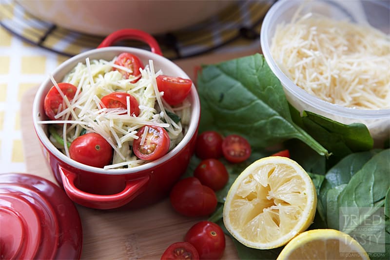 Creamy Spinach Tomato Linguine // A fantastic weeknight meal that you can throw together in a cinch, but looks like you spent hours in the kitchen! The wonderful flavors marry so well together. Tastes great with a slice of your favorite bread! | Tried and Tasty