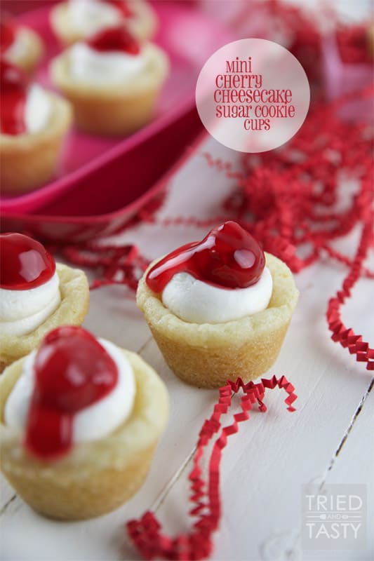 Mini Cherry Cheesecake Sugar Cookie Cups // These delicious little bite-sized bits of heaven are perfect for Valentine's Day! They are mini, fit right in the palm of your hand, and will be gobbled up in no time. With the tiniest hint of coconut, you'll be left wanting more! | Tried and Tasty