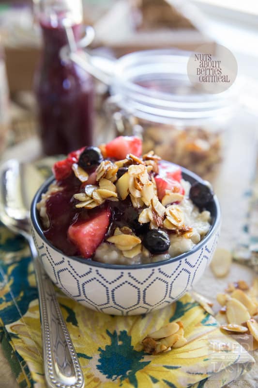 Nuts About Berries Oatmeal // Spice up your breakfast routine with this delicious oatmeal! Topped with fresh berries, warm berry compote, and maple candied almonds. An excellent and hearty way to start your day! |Tried and Tasty