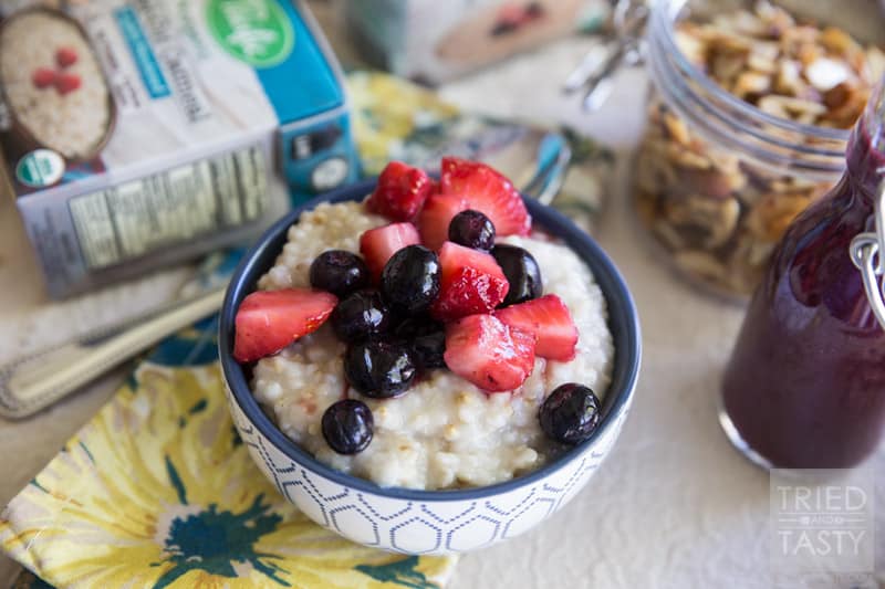 Nuts About Berries Oatmeal // Spice up your breakfast routine with this delicious oatmeal! Topped with fresh berries, warm berry compote, and maple candied almonds. An excellent and hearty way to start your day! |Tried and Tasty