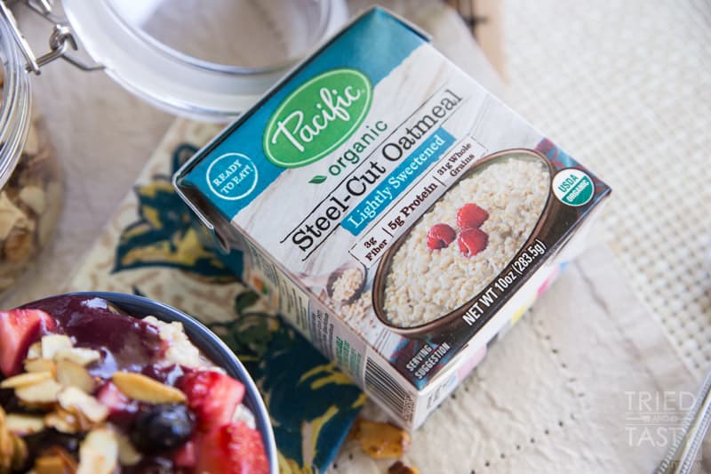 Nuts About Berries Oatmeal // Spice up your breakfast routine with this delicious oatmeal! Topped with fresh berries, warm berry compote, and maple candied almonds. An excellent and hearty way to start your day! |Tried and Tasty