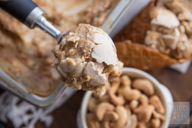 Nutty Salted Caramel Coconut Ice Cream // If you love coconut and cashews, you have found the one and only ice cream recipe you will ever need. Made without any refined sugar, with a velvety smooth date caramel ribbon, you'll find yourself sneaking to the freezer for a scoop time and time again! | Tried and Tasty