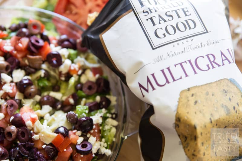 Skinny Greek Dip // If you want a flavor explosion in your mouth, I highly suggest you make this fantastic dip! There are no words to explain just how delicious this yummy appetizer is. Trust me, if you love Greek food, the flavors will have you begging for just 'one more scoop'! | Tried and Tasty