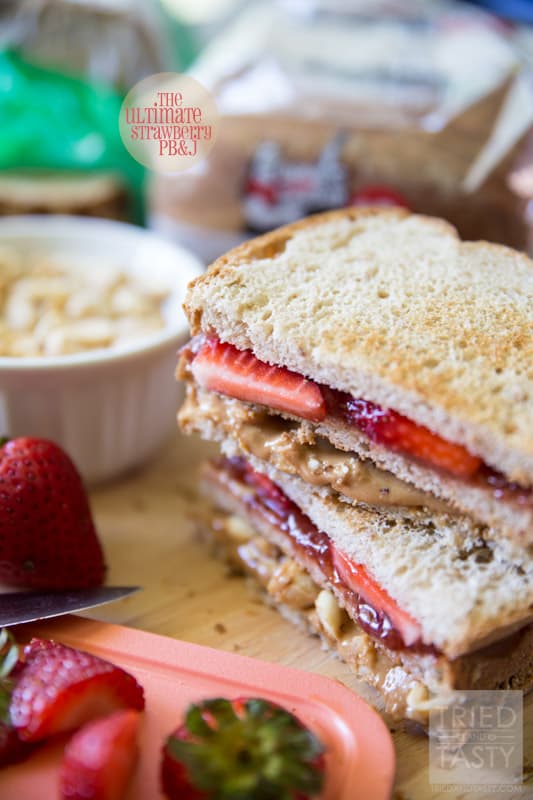 The Ultimate Strawberry PB&J // Who says peanut butter and jelly sandwiches have to be boring? This double-decker knockout creation has two extra special add-ins. Come see what they are and how to make this mouth-watering pb&j! | Tried and Tasty