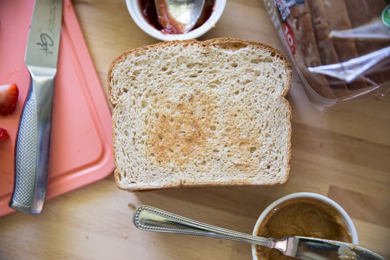 The Ultimate Strawberry PB&J // Who says peanut butter and jelly sandwiches have to be boring? This double-decker knockout creation has two extra special add-ins. Come see what they are and how to make this mouth-watering pb&j! | Tried and Tasty
