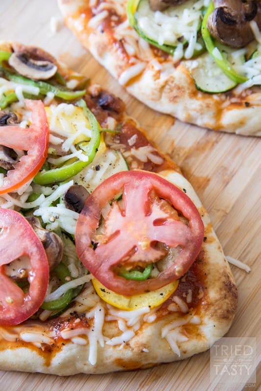 Grilled Veggie Flatbread Pizza // Looking for a low-cal dinner idea to use up some of those garden fresh veggies you've probably got in abundance? This pizza is perfect! It's tasty, is easy, and it's great for those watching their calories! |Tried and Tasty