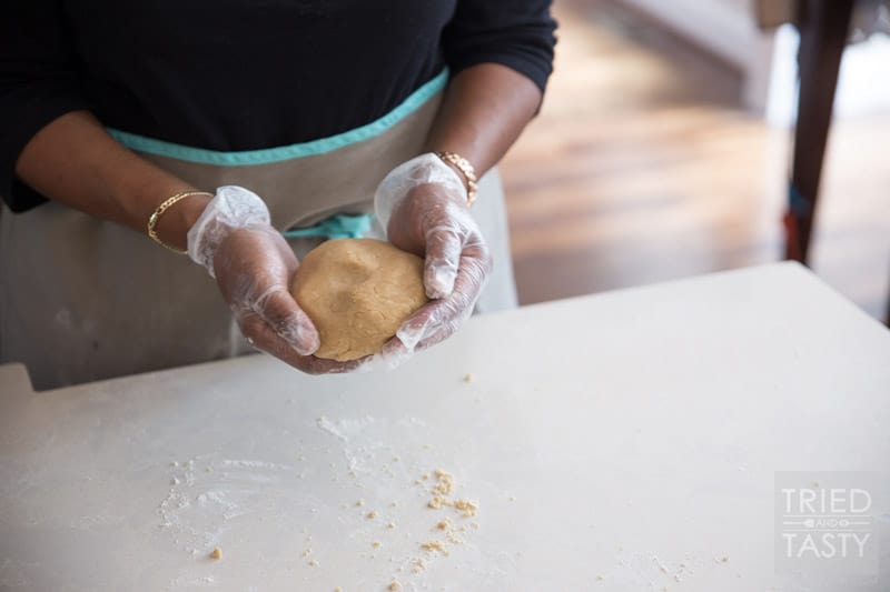 Mom's Sweet Potato Pie // This sweet potato pie is legendary and has been passed down from my grandfather and grandmother to my own mother and now to me. This is the MUST HAVE recipe of the fall season that can be enjoyed for Halloween, Thanksgiving, and any other day of the year! The perfect addition to any dessert table. | Tried and Tasty
