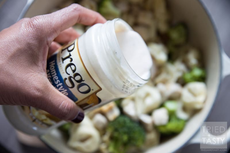 One Pot Chicken & Broccoli Tortellini // Five ingredients, 30 minutes, and one delicious dinner the whole family will love! Made with Prego Alfredo you'll have a flavorful & saucy dinner perfect for any day of the week! | Tried and Tasty