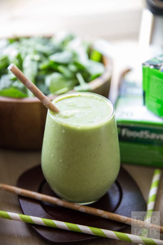 Pineapple Coconut Green Smoothie // Want a delicious way to begin your morning? This healthy smoothie has nutrition, flavor, and a taste of the tropics! Come check out this tutorial on how to make freezer smoothie packs. Never rush out of the house without breakfast again! | Tried and Tasty