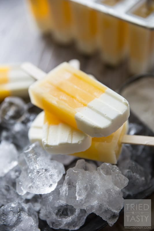 Tropical Candy Corn Popsicles // This 'candy corn' inspired treat is a healthy variation for all of your guilt-free treat needs! Perfectly tropical with the flavors of coconut, pineapple and orange you're tastebuds will say THANK YOU! | Tried and Tasty
