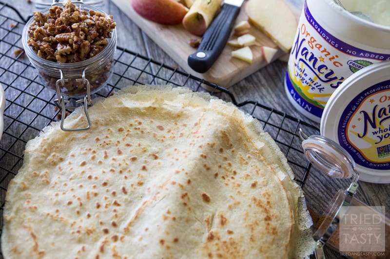 Apple Pie Crepes // This fall start your morning off with these delicious crepes that will make you think you're eating a slice of apple pie for breakfast! Made with all-natural ingredients this is one healthy breakfast you can feel good about splurging on! | Tried and Tasty