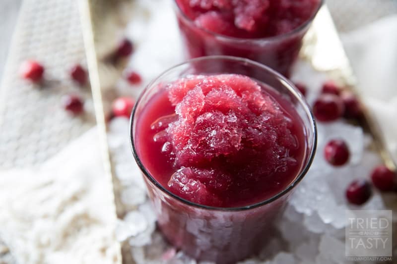 Cran-Pomegranate Citrus Slushie // The tangy flavors of this power packed slushie will have your tastebuds dancing to a new tune! Non-alcoholic and perfect for all of the guests at your holiday party! | Tried and Tasty