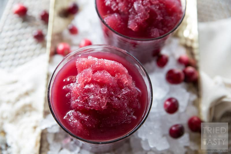 Cran-Pomegranate Citrus Slushie // The tangy flavors of this power packed slushie will have your tastebuds dancing to a new tune! Non-alcoholic and perfect for all of the guests at your holiday party! | Tried and Tasty