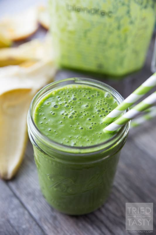 Banana Orange Green Smoothie // Doesn't get any easier than this delicious smoothie! All you need are a few key ingredients and you'll be on your way to a nutrition packed, no-sugar added, simple smoothie. Perfect to jump start your morning. Great for a mid-afternoon pick-me-up. Great for an afternoon snack the whole family will enjoy! | Tried and Tasty