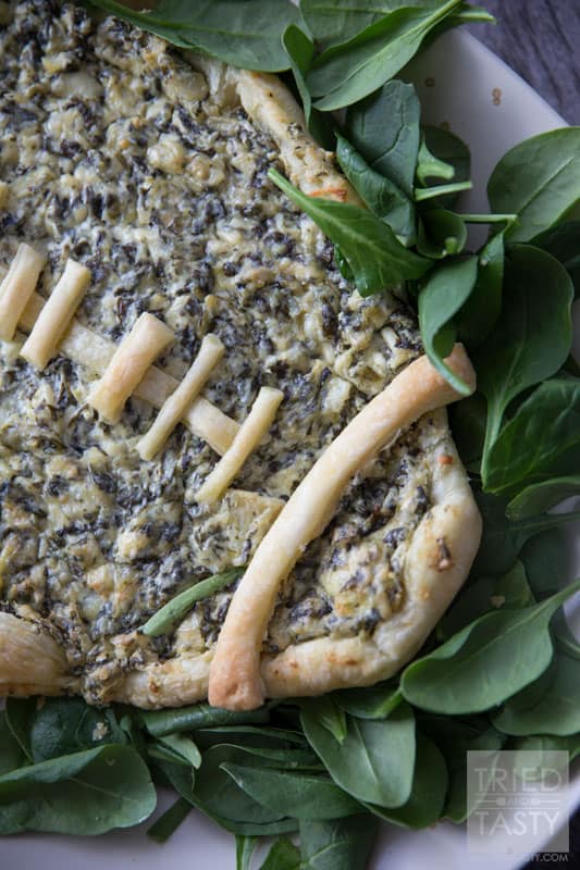 Football Spinach & Artichoke Dip // This two ingredient appetizer is sure to be a hit at your next game day party. Made with only two ingredients you can whip this up in little to no time. Serve with your favorite veggies or chips! | Tried and Tasty