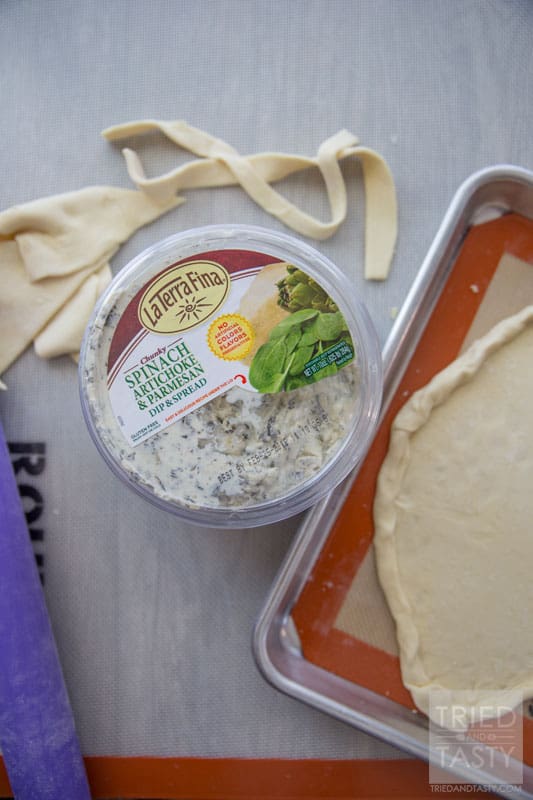 Football Spinach & Artichoke Dip // This two ingredient appetizer is sure to be a hit at your next game day party. Made with only two ingredients you can whip this up in little to no time. Serve with your favorite veggies or chips! | Tried and Tasty