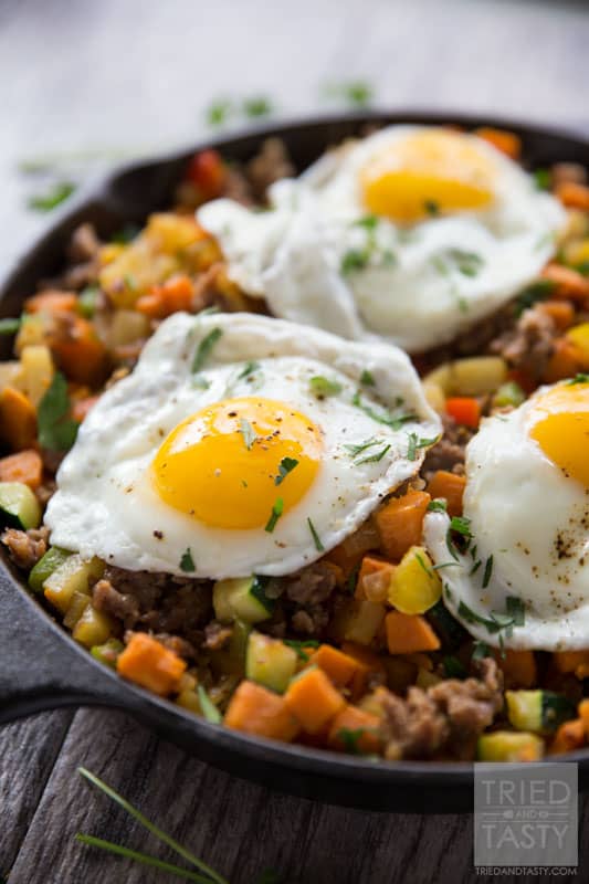 Sweet Potato & Sausage Breakfast Hash // Looking for a filling, delicious, and healthy breakfasT? This sweet potato & sausage hash is an excellent choice. Loaded with veggies and more - you'll want to start every morning with this tasty dish! | Tried and Tasty
