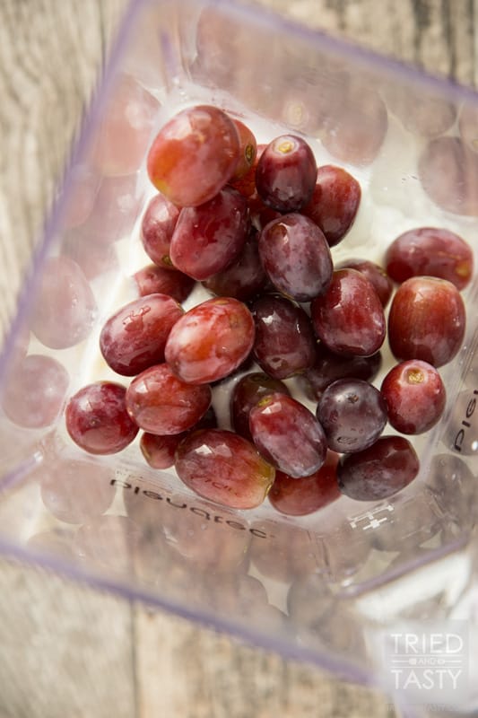 Simple Grape Smoothie // Ever had a grape smoothie before? The next time you buy red grapes - keep this in mind. It's the perfect balance of sweet & tart and has just a few ingredients. Spin a quick cycle in your blender and you'll have a great way to start your day or pick-me-up when you need it! | Tried and Tasty