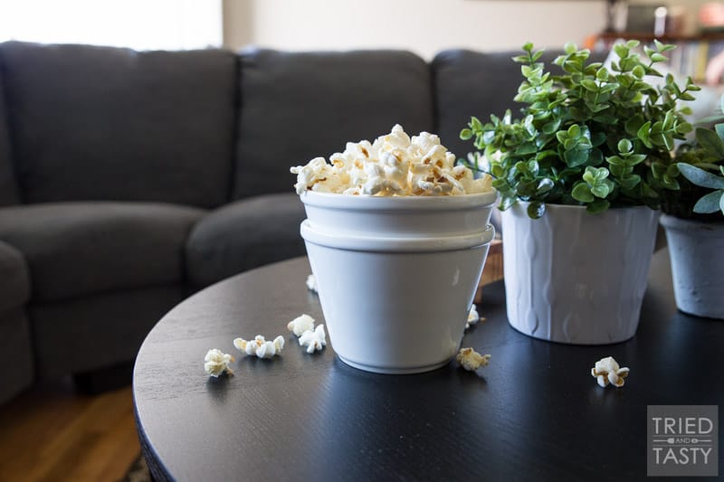 Honey Butter Popcorn // The kids will flip over this delicious popcorn recipe! You only need five ingredients - and I can almost guarantee you have everything on hand already. Plus, there's no microwave involved - say goodbye to yucky chemicals! | Tried and Tasty