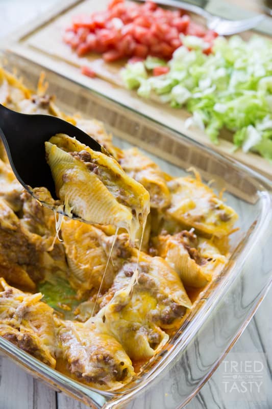 Taco Stuffed Shells // For all the Mexican food lovers out there, these Taco Stuffed Shells are for you! So easy, so delicious and just as good as leftovers as the day you make them. Top with your favorite taco toppings and enjoy! | Tried and Tasty