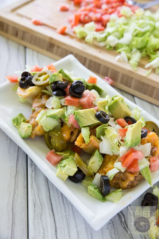Taco Stuffed Shells // For all the Mexican food lovers out there, these Taco Stuffed Shells are for you! So easy, so delicious and just as good as leftovers as the day you make them. Top with your favorite taco toppings and enjoy! | Tried and Tasty