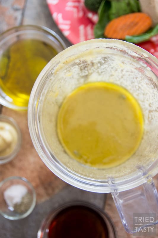 Low Calorie Dijon Dressing // Nothing can make a healthy salad unhealthy faster than the dressing you put on it! This low-cal dijon is exactly what you need if you're looking to maintain taste without sacrificing your nutrition! Especially great on top of Taylor Farms Snappy Spinach Salad! | Tried and Tasty