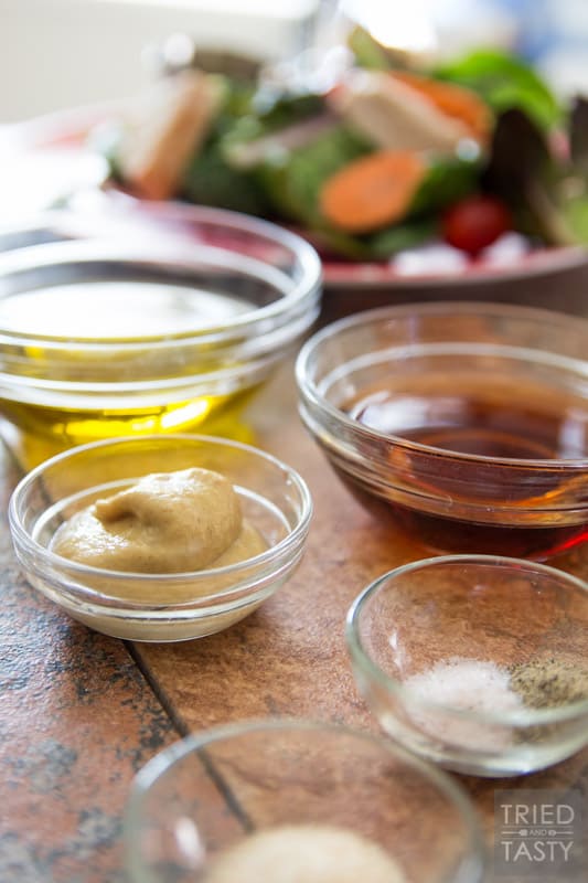 Low Calorie Dijon Dressing // Nothing can make a healthy salad unhealthy faster than the dressing you put on it! This low-cal dijon is exactly what you need if you're looking to maintain taste without sacrificing your nutrition! Especially great on top of Taylor Farms Snappy Spinach Salad! | Tried and Tasty